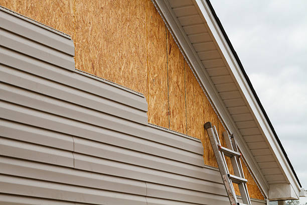 Professional Siding technician working in Woodstock, GA